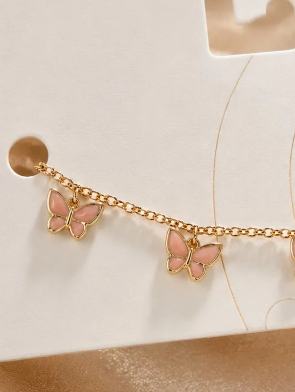 Urban Outfitters Gold Chain Necklace with Pink Butterfly Charms